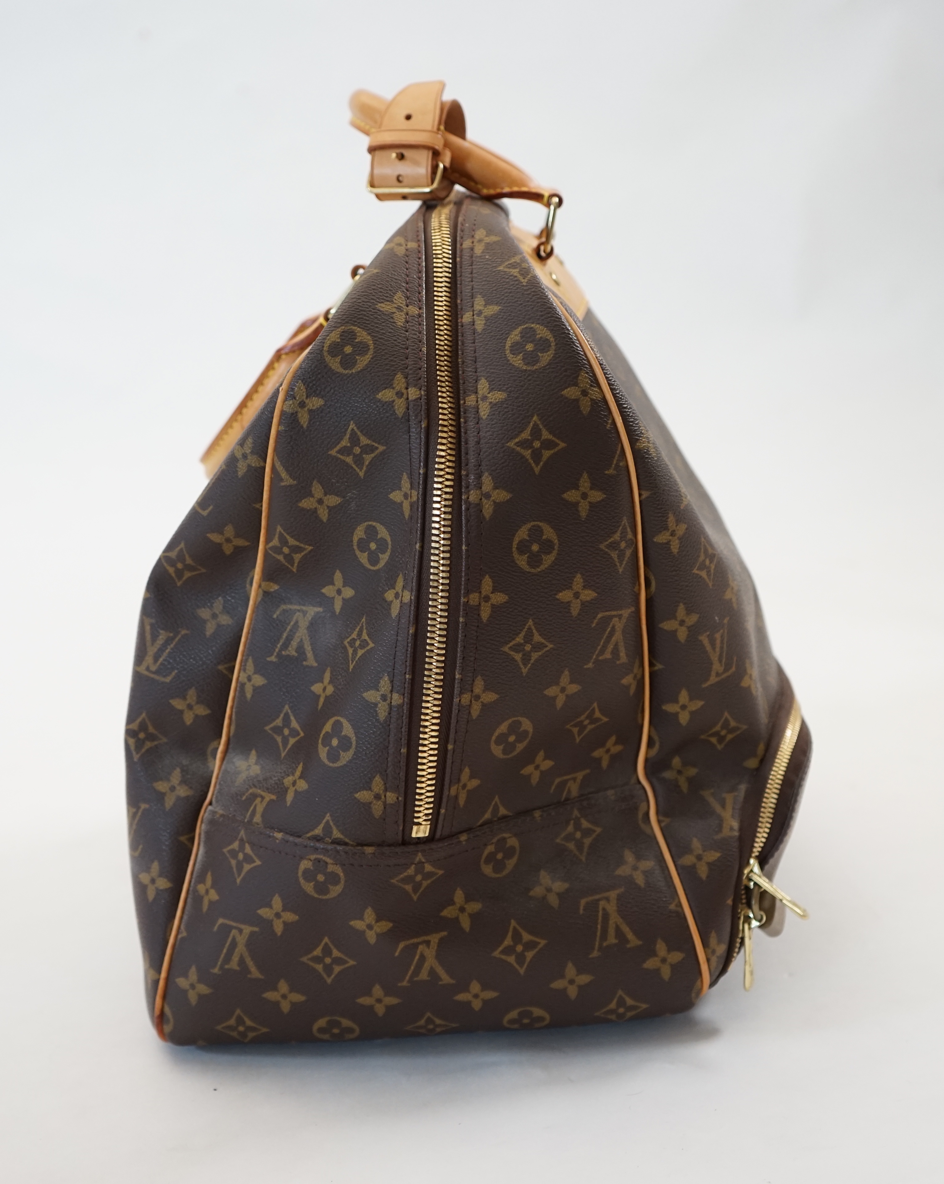 A Louis Vuitton Evasion travel bag width 38cm, depth 23cm, length 33cm, hand drop 12cm